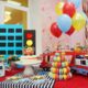 Colorful Balloons And Table With Cakes For Child Birthday Celebration.