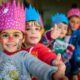 Cute & Happy Children Showing Thumbs Up In A Party Celebration.